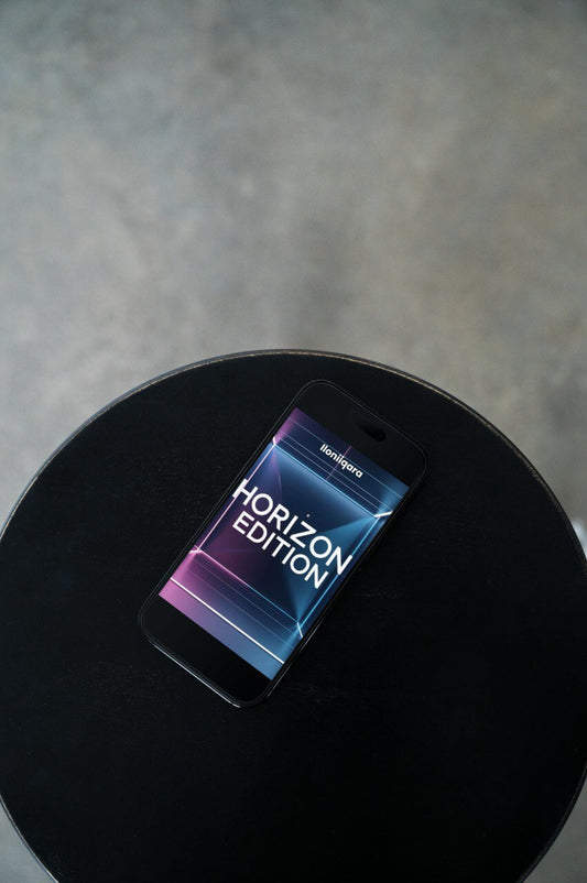 Phone with 'Horizon Edition' guide display on a black surface