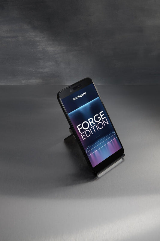 Smartphone on a stand with 'Iloniiqara' branding and 'Forge Edition' text on a dark background
